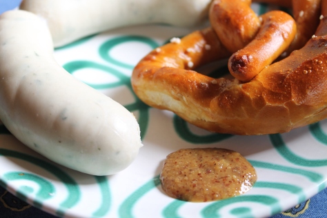 Typical Bavarian meal of soft pretzel, weisswurst and Bavarian sweet mustard. 